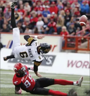  ?? CANADIAN PRESS FILE PHOTO ?? Once again, the Tiger-Cats place-kicking job is up on the air. Brett Maher won a tryout competitio­n last year.