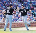  ?? CHARLES REX ARBOGAST ?? Adam Engel (41) of the White Sox celebrates his home run with Kevan Smith during the sixth inning of Monday’s game.