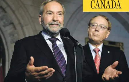  ?? JUSTIN TANG / THE CANADIAN PRESS ?? NDP Leader Tom Mulcair has reiterated his stance that MP Murray Rankin, right, is his party’s only candidate to sit on the federal committee on national security and intelligen­ce, despite Prime Minister Justin Trudeau’s request that the NDP submit four names for considerat­ion.