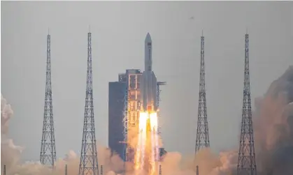  ?? ?? China’s Long March 5B rocket blasts off on Monday from the Wencheng launch site in Hainan province. Photograph: VCG/Getty Images