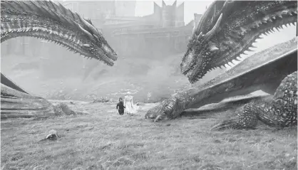  ?? PHOTOS BY HBO ?? Dany flies her dragons north to help with the battle. Sorry about your brother, guys.