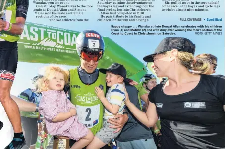  ?? PHOTO: GETTY IMAGES ?? Happy chappy . . . Wanaka athlete Dougal Allan celebrates with his children Flynn (4) and Matilda (2) and wife Amy after winning the men’s section of the Coast to Coast in Christchur­ch on Saturday.