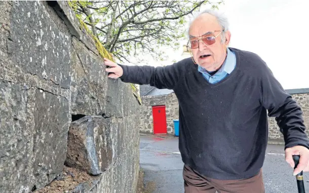  ??  ?? ANGRY: Bill Mccallum, 80, faces large repair bills after his garden wall was damaged by drivers in three different incidents in six months.
