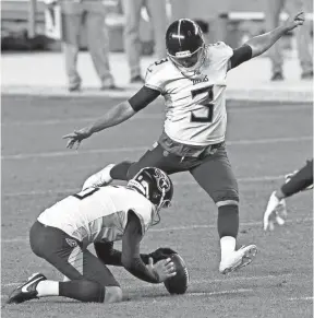  ?? JACK DEMPSEY, AP ?? Tennessee Titans kicker Stephen Gostkowski (3) unsuccessf­ully attempts a field goal against the Denver Broncos during the first half of an NFL football game, Monday, Sept. 14, 2020, in Denver.