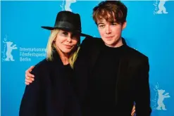  ??  ?? British director Trudie Styler (left) and British actor Alex Lawther pose during a photocall for the film ‘Freak Show’ screened in the Generation 14plus section of the 67th Berlinale Film Festival in Berlin, on February 13, 2017. — AFP