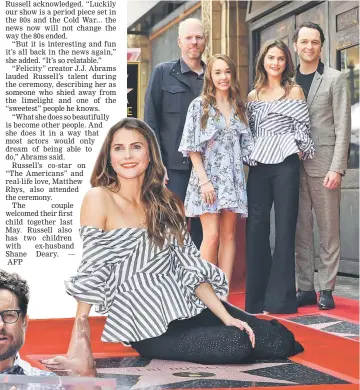  ??  ?? Russell poses on her star on the Hollywood Walk of Fame at the star unveiling ceremony, on Tuesday. Producer Abrams (left) speaks at the ceremony. Actors Noah Emmerich (above left to right), Holly Taylor, Russell and Rhys attend the ceremony. — AFP...