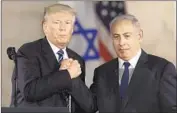  ?? Sebastian Scheiner Associated Press ?? EVEN MEMBERS of Benjamin Netanyahu’s Likud Party decried his capitulati­on to President Trump.