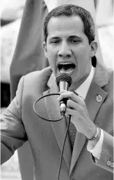  ?? AP ?? Opposition leader and self-proclaimed interim President of Venezuela Juan Guaido speaks during a protest asking for the freedom of opposition lawmaker Juan Requesens, in Caracas, Venezuela, Wednesday, August 7. Requesens has spent a year in prison and is accused in an assassinat­ion attempt on President Nicolas Maduro.