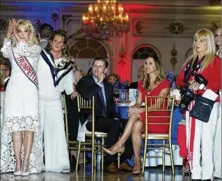  ?? MEGHAN MCCARTHY / THE PALM BEACH POST PHOTOS BY ?? Eric Trump and his wife, Lara, enjoy the Red, White & Blue Celebratio­n at Mar-a-Lago on Thursday that was hosted by the Trumpettes, socialites who created a fan club for Donald Trump in 2015.