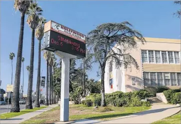  ?? Irfan Khan Los Angeles Times ?? A DIGITAL BILLBOARD is being considered for Hollywood High School. Ads would face away from the school, toward Hollywood Boulevard and Highland Avenue. The school board will take up the idea this month.