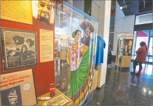  ?? (The Salt Lake Tribune/Leah Hogsten) ?? This photo shows a Mexican mariachi theme “scene setters” in Salt Lake City. The Leonardo’s exhibit “Sorting Out Race” is a collection of vintage objects that display stereotypi­cal racial imagery.