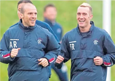  ?? Picture: SNS. ?? Alex Rae and Fernando Ricksen were the midfield pairing when Rangers won the title in 2005.