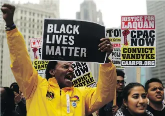  ?? JOSHUA LOTT/GETTY IMAGES ?? Demonstrat­ors in Chicago celebrate the guilty verdict in the murder trial of a police officer on Oct. 5. The U.S. has 50 times more fatal police shootings than Canada.