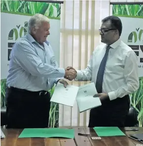  ?? Photo: Maria Laqeta ?? Fiji Sugar Corporatio­n chief executive officer Graham Clark and Office of the Prime Minister and Ministry of Sugar Industry, Permanent Secretary Yogesh Karan at the FSC head office in Lautoka on February 21,2018.