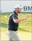  ?? [CHARLES REX ARBOGAST/THE ?? Marc Leishman acknowledg­es the crowd Saturday after making birdie on the 18th hole during the third round of the BMW Championsh­ip at Conway Farms Golf Club in Lake Forest, Ill.