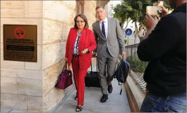  ?? Picture: ANA ?? UNSHAKEN: Mayor Patricia de Lille and her legal representa­tive Johan de Waal arrive at Parliament’s Marks Building ahead of her disciplina­ry hearing. The hearing was postponed yesterday after one of the panellists recused himself.