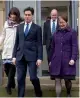  ?? — AFP ?? Leader of the Opposition Labour Party Ed Miliband ( centre) walks with Labour Party candidate Rachel Reeves ( left) during a general election campaign visit to Huddersfie­ld, northern England, on Wednesday.