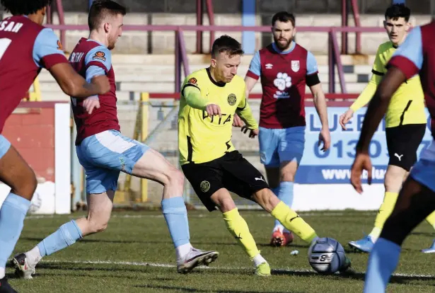  ?? Www.mphotograp­hic.co.uk ?? Elliot Newby is crowded out during Saturday’s frustratin­g 1-0 defeat at Weymouth