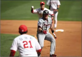  ??  ?? Below, Hoying when he played for the Hanwha Eagles is tagged out during the Korean Baseball Organizati­on League opening game between SK Wyverns and Hanwha Eagles at the empty SK Happy Dream Ballpark on May 5, 2020 in Incheon, South Korea.