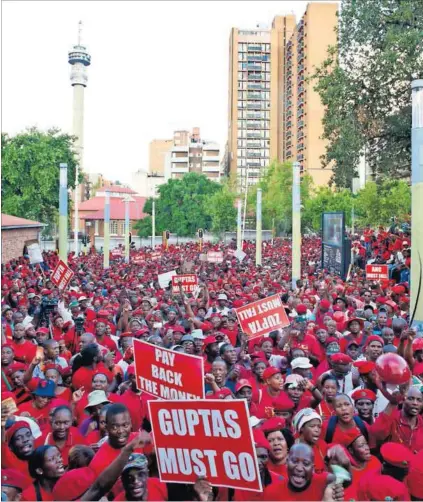  ?? Photo: Delwyn Verasamy ?? Seeing red: Economic Freedom Fighters members flood the streets ahead of President Jacob Zuma’s court appearance relating to the non-security upgrades on his Nkandla home.