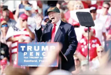  ?? GREGG NEWTON/AFP ?? Republican presidenti­al nominee Donald Trump addresses supporters at a rally on the tarmac of the Orlando-Sanford Internatio­nal Airport in Sanford, Florida, on Tuesday.