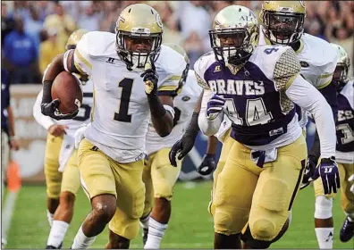  ?? AP/ JOHN AMIS ?? Alcorn State linebacker Darien Anderson ( right) tries to chase down Georgia Tech running back Qua Searcy during a game last season in Atlanta. Anderson, a 6- 1, 240- pound senior, has 30 tackles and 61/ sacks this season for a Braves defense that...