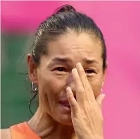  ?? AFP ?? “It’s finally over,” a tearful Kimiko Date told fans. —