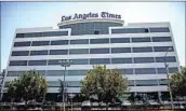  ?? Jay L. Clendenin Los Angeles Times ?? THE L.A. TIMES reportedly plans to lay off 20% of its newsroom staff. Above, its El Segundo offices.