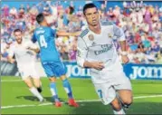  ?? REUTERS ?? Cristiano Ronaldo celebrates after scoring Real Madrid’s winner against Getafe in the 85th minute.