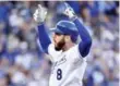  ?? NATHAN DENETTE/THE CANADIAN PRESS ?? Losing all-star third baseman Mike Moustakas for the season to a torn ACL has been costly for the Royals.