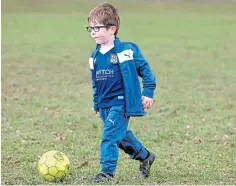  ??  ?? Five-year-old Sam Mcdonald takes part in training.