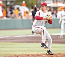  ?? Photo By Kate Luffman/Tennessee Athletics ?? ■ Arkansas Razorbacks pitcher Lael Lockhart works on the mound during a game with the Tennessee Volunteers on May 16 at Lindsey Nelson Stadium in Knoxville, Tennessee.