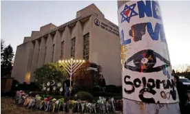  ?? ?? A menorah is placed outside the Tree of Life Synagogue in preparatio­n for a celebratio­n service on 2 2018 in the Squirrel Hill neighborho­od of Pittsburgh. Photograph: Gene J Puskar/ AP