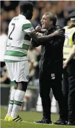  ??  ?? Do it my way: Celtic manager Brendan Rodgers, right, with Kolo Toure