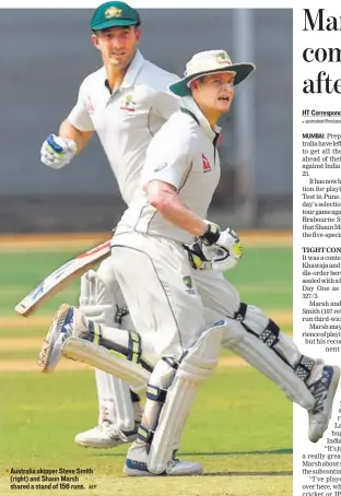  ??  ?? Australia skipper Steve Smith (right) and Shaun Marsh shared a stand of 156 runs. AFP