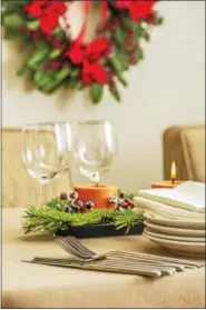  ?? METRO CREATIVE GRAPHICS ?? Hosts can invite guests to join in the preparatio­n of holiday dishes that appeal to those with dietary restrictio­ns.