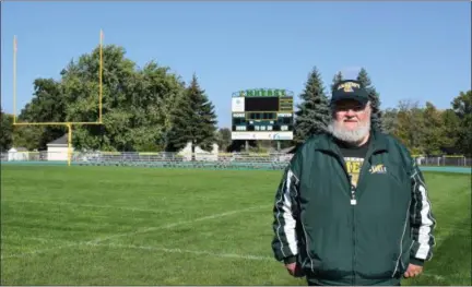  ?? BRIANA CONTRERAS — THE MORNING JOURNAL ?? Gary Greiner, 69, an Amherst native and 1967 Steele High graduate, has been the down-marker operator at Memorial Field, 450 Washington St., during Comet varsity football games for 51 years. Greiner is involved in the Amherst community as a girls volleyball and boys basketball game announcer.