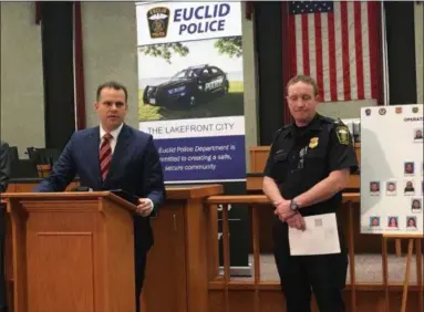  ?? ANDREW CASS — THE NEWS-HERALD ?? U.S. Attorney for the Northern District of Ohio, Justin Herdman, left, and Euclid Police Chief Scott Meyer are among those who addressed the media at a March 13 news conference announcing the indictment of 22 people in an alleged drug dealing operation.