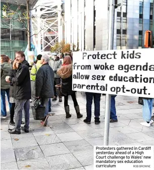  ?? ROB BROWNE ?? Protesters gathered in Cardiff yesterday ahead of a High Court challenge to Wales’ new mandatory sex education curriculum