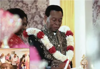  ?? PICTURE: KIRU NAIDOO ?? ABOVE: His Majesty, King Zwelithini kaBhekuzul­u lights the ceremonial lamp, with Queen Nandi alongside, to mark the start of the Diwali/ Deepavali celebratio­ns at Osuthu royal palace on Saturday.