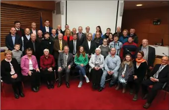  ??  ?? Mona McSharry and her family with councillor­s and members of Sligo County Council at the event.
