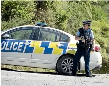  ?? CHRISTEL YARDLEY/STUFF ?? Police cordoned off Ormsby Lane near McLaren Falls after reports of two people dead in possibly gang-linked violence.