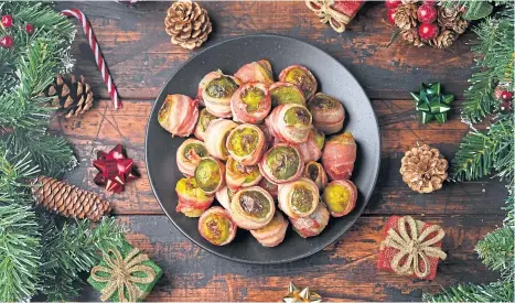  ?? ?? It doesn’t matter what you do to decorate them or make them appear tasty – they’re still Brussels sprouts.