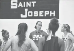  ?? BRAD HORRIGAN | BHORRIGAN@COURANT.COM ?? FORMER UCONN WOMEN’S basketball star and new St. Joseph women’s coach Wendy Davis talks to her players during a recent practice.