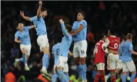  ?? ?? John Stones celebrates scoring against Arsenal for a Manchester City team so good they appear to be operating to a different set of laws. Photograph: Phil Noble/Reuters