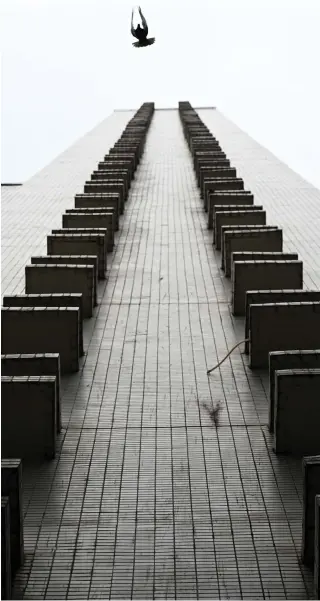  ?? Photo by Peter PARKS / AFP ?? This photo shows air conditioni­ng units on the side of a residentia­l building in Hong Kong on April 30, 2024.