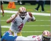  ?? COREY SIPKIN — THE ASSOCIATED PRESS ?? 49ers QB Nick Mullens calls a play during the first half against the New York Giants on Sunday.