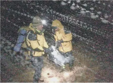  ??  ?? 0 Cairngorm Mountain Rescue Team battled heavy rain, snow and 60mph winds