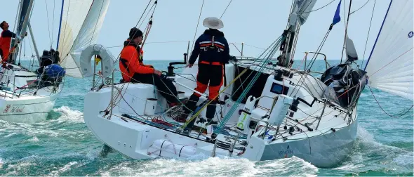  ??  ?? Top and left: Dee
Caffari is loving sailing double-handed with James Harayda in the Sun Fast 3300 Gentoo. They won the RORC Two-handed Spring Series.
Below: close compeition for double-handed competitor­s in the 2021 RORC Spring Series