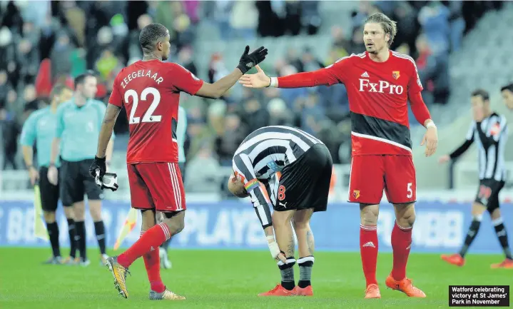  ??  ?? Watford celebratin­g victory at St James’ Park in November